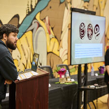 Artist, Carlos Julian, speaks about the artwork he designed for the new enhancement agreement document