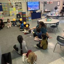 Division 12 is having their morning circle and talking about if they are ready to learn. This is an important start to the day as they are building community. 